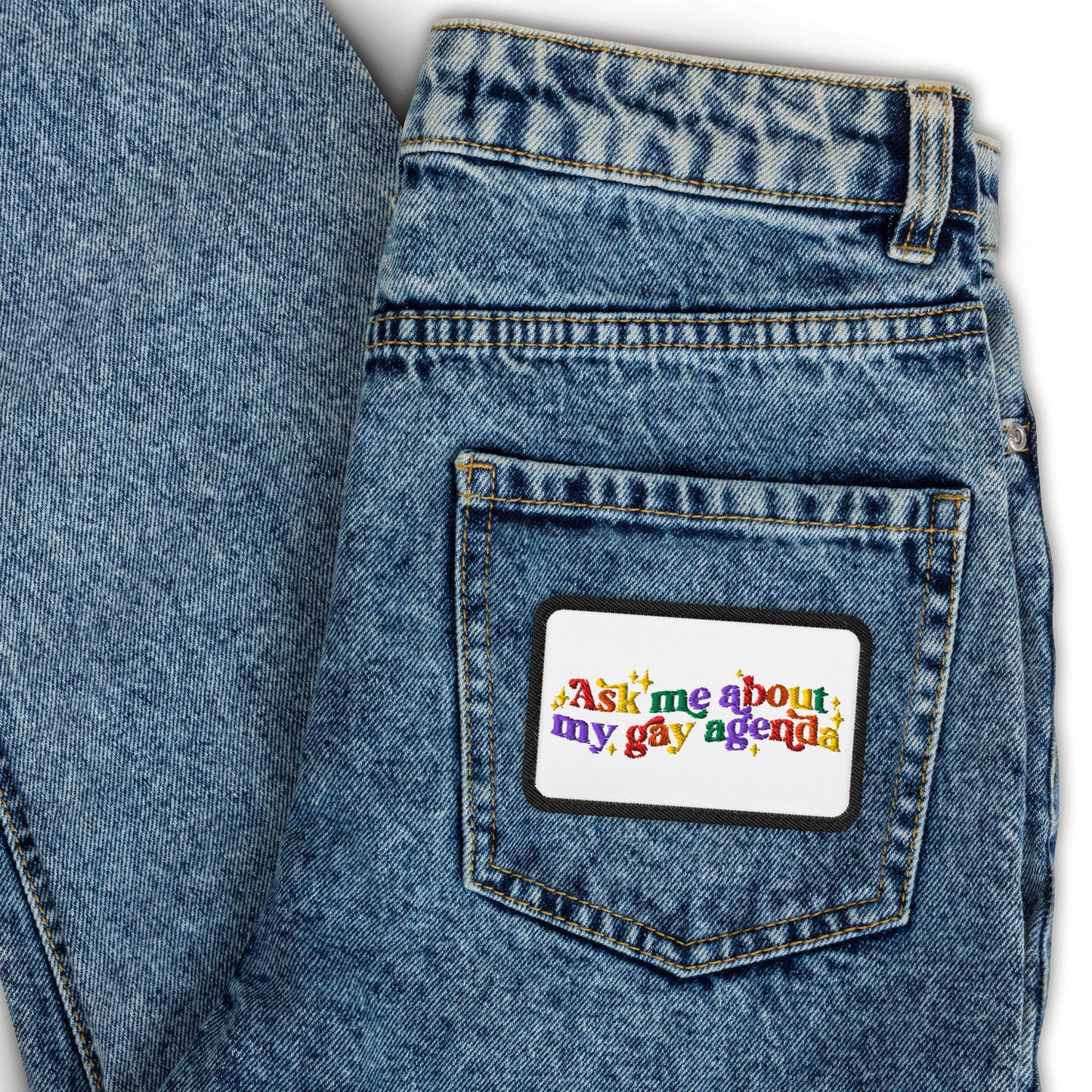 Ask Me About My Gay Agenda Embroidered Patch by Spinsterly Co, black 3 inch conversation patch on denim