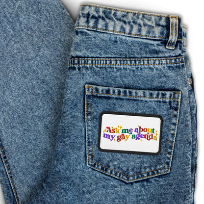 Ask Me About My Gay Agenda Embroidered Patch by Spinsterly Co, black 3 inch conversation patch on denim