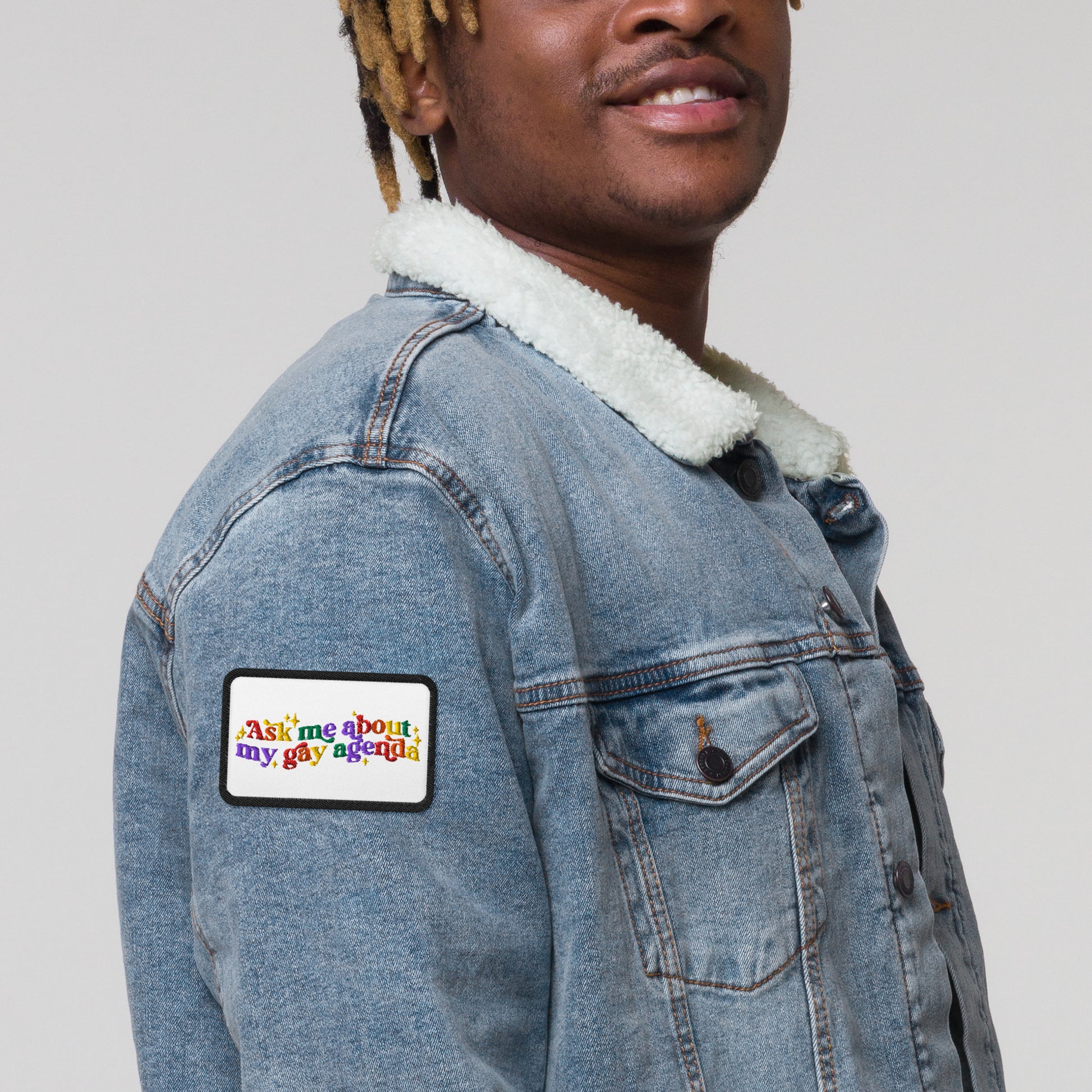 Ask Me About My Gay Agenda Embroidered Patch by Spinsterly Co, black 3 inch patch with conversation-style design