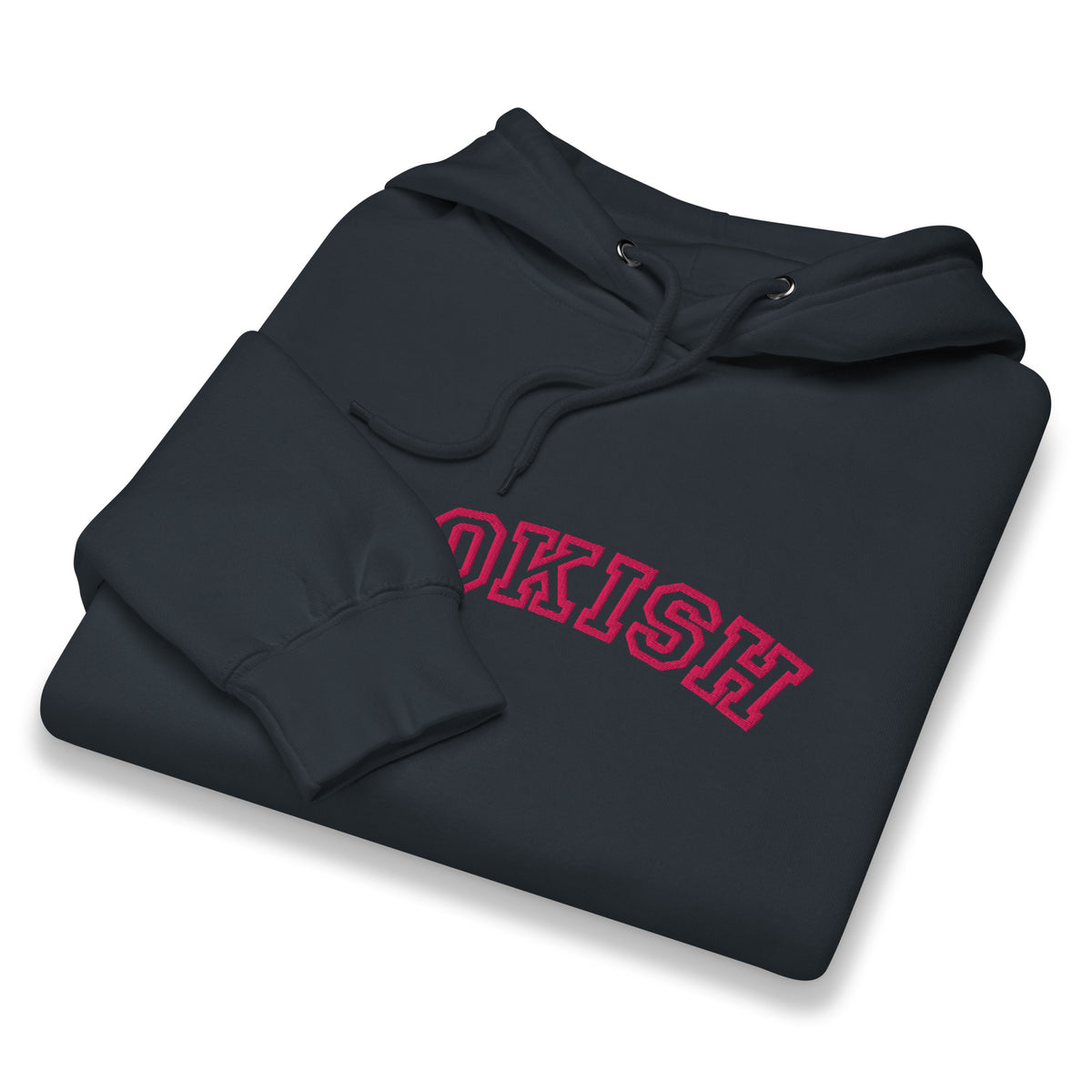 A folded black hoodie with 'BOOKISH' embroidered in pink varsity-style lettering embroidered across the chest, displayed on a clean white background.