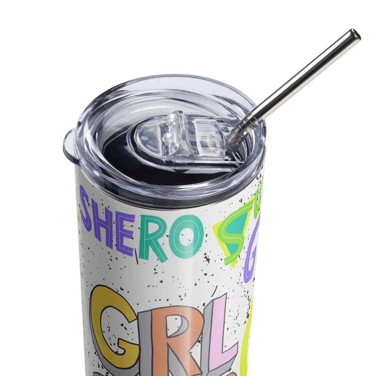 A close-up of a white insulated tumbler with colorful 'SHERO' text, and other feminist inspired sticker style designs a clear lid, and a metal straw on a white background.