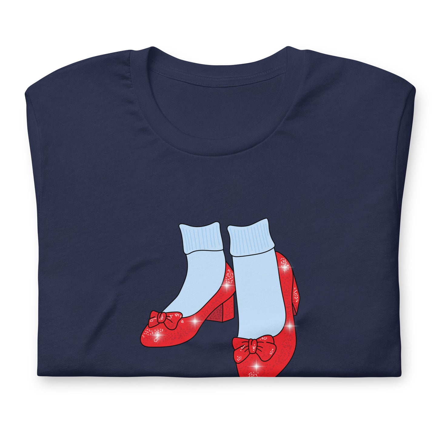 Close-up of the ruby-slipper design on a folded navy Friends of Dorothy t-shirt.
