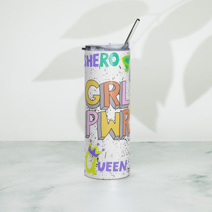 A tall, skinny stainless steel tumbler with a clear lid and metal straw, featuring colorful retro-style sticker inspired design with feminist, girl power phrases like 'SHEROES', 'GRL POWER', 'QUEEN' on a white speckled background.