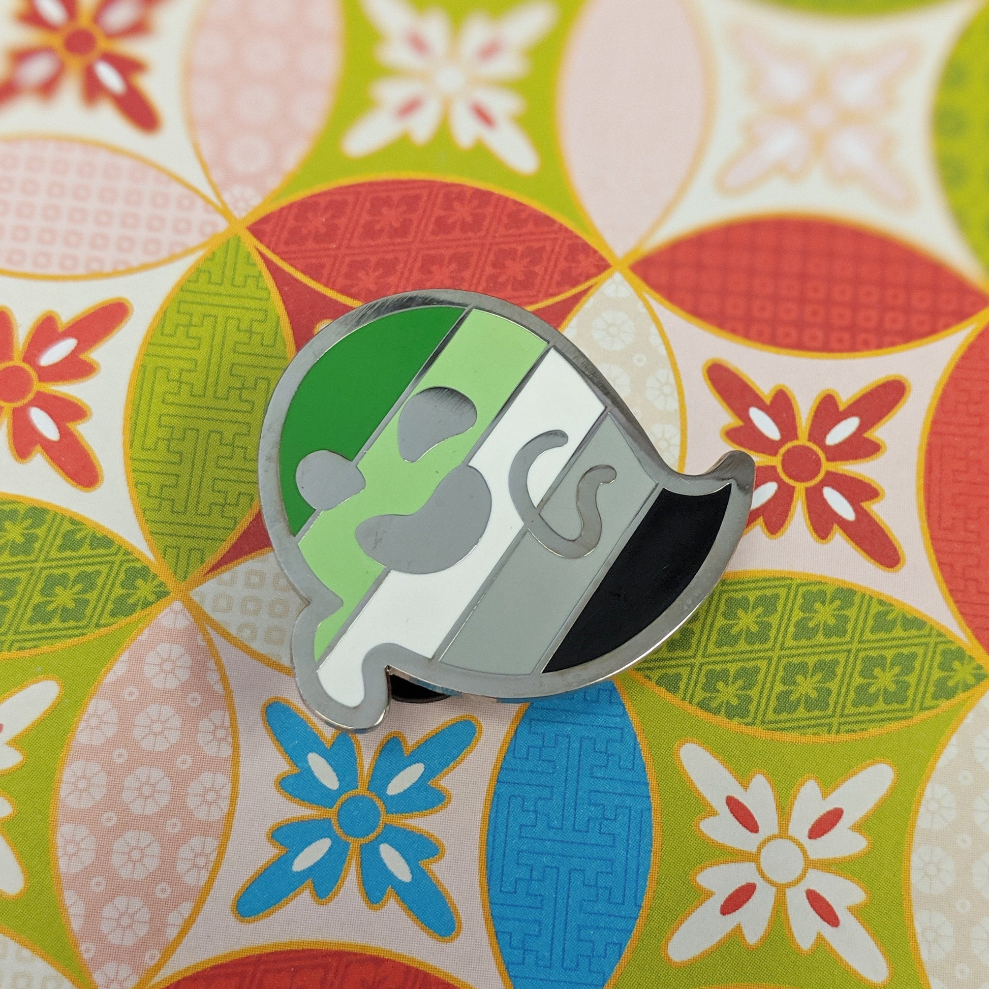 Gaysper Friends Hard Enamel Pride Pins by Cunning Linguist Co, silver ghost pin with green and white enamel
