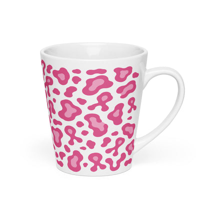 A white ceramic coffee mug with a pink leopard print pattern, shown on a clean white background.