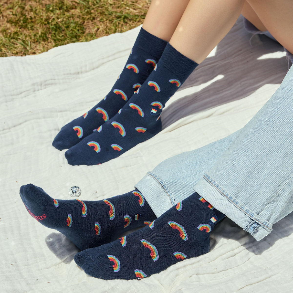 Socks that Save LGBTQ Lives — Navy Rainbow Crew Socks | LGBTQ+ Pride | Organic Cotton - Spinsterly Co