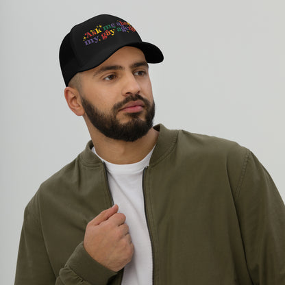 Ask Me About My Gay Agenda Trucker Hat LGBTQIA Pride Cap by Spinsterly Co in Black with embroidered text graphic