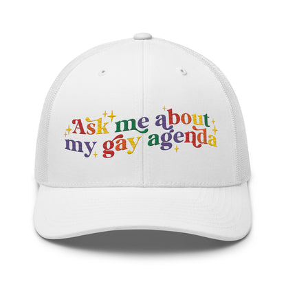 Ask Me About My Gay Agenda Trucker Hat LGBTQIA Pride Cap by Spinsterly Co in white with embroidered text graphic