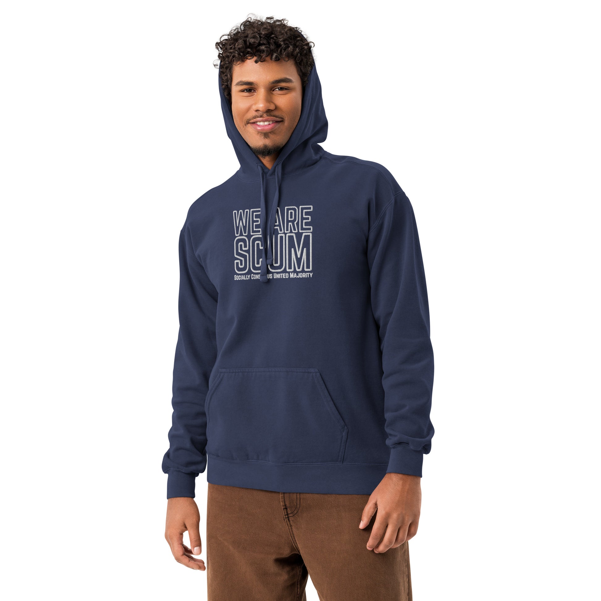 A man wearing a navy blue pullover hoodie with a white graphic print on the chest that reads 'THIS LING EPIC', paired with brown pants, set against a plain white background.