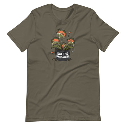 An olive green short-sleeve t-shirt with a central graphic of a potted carnivorous plant with the text 'EAT THE PATRIARCHY' and small red hearts, displayed on a solid white background.