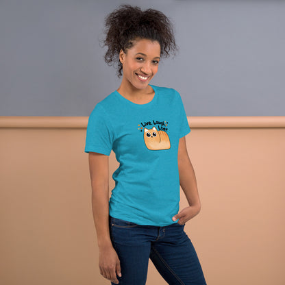 front right side profile of a woman wearing a heather aqua unisex t-shirt featuring the kawaii style cat and phrase Live Laugh Loaf