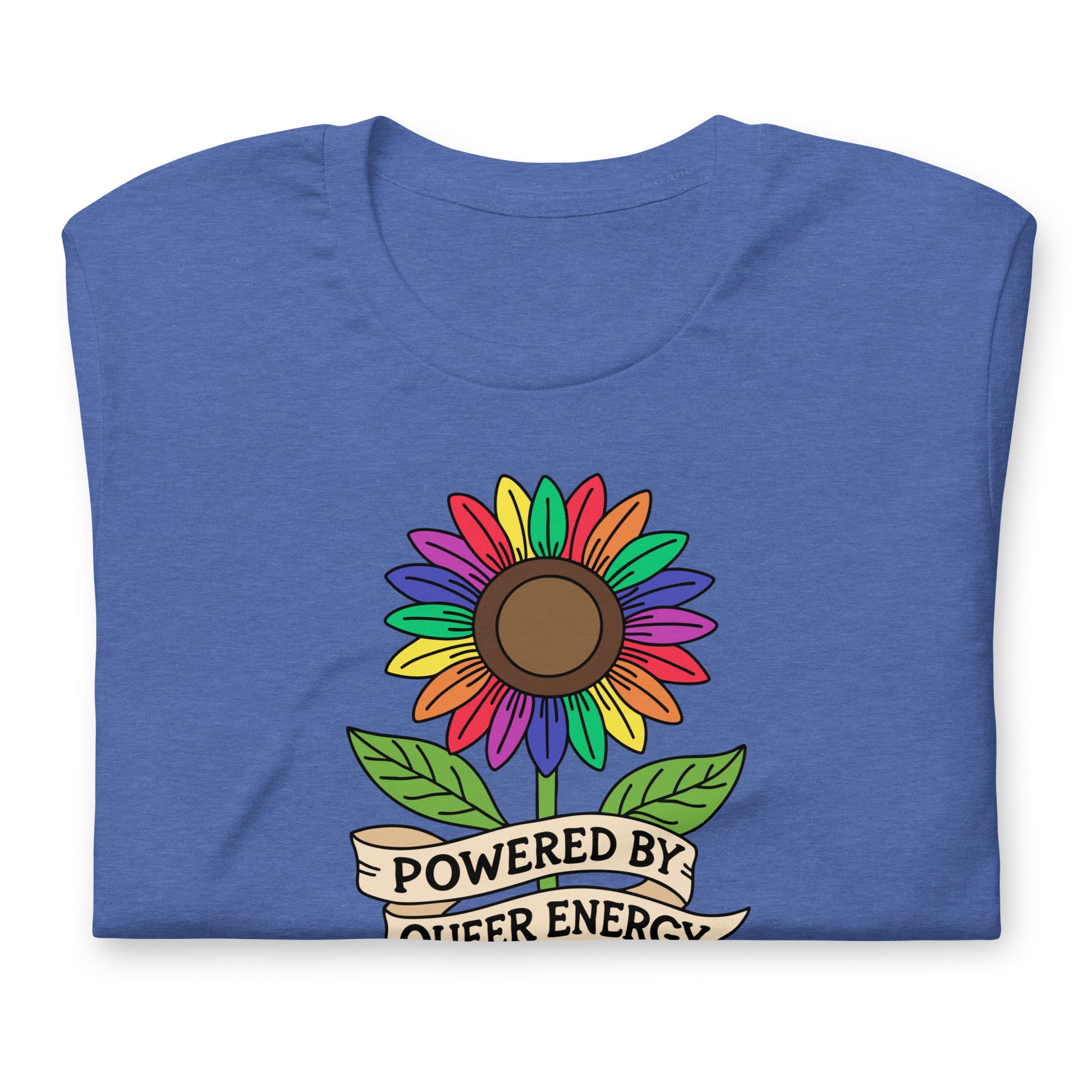 A folded heather blue t-shirt featuring a colorful rainbow sunflower graphic with green leaves and a cream banner that reads 'POWERED BY QUEER ENERGY'.