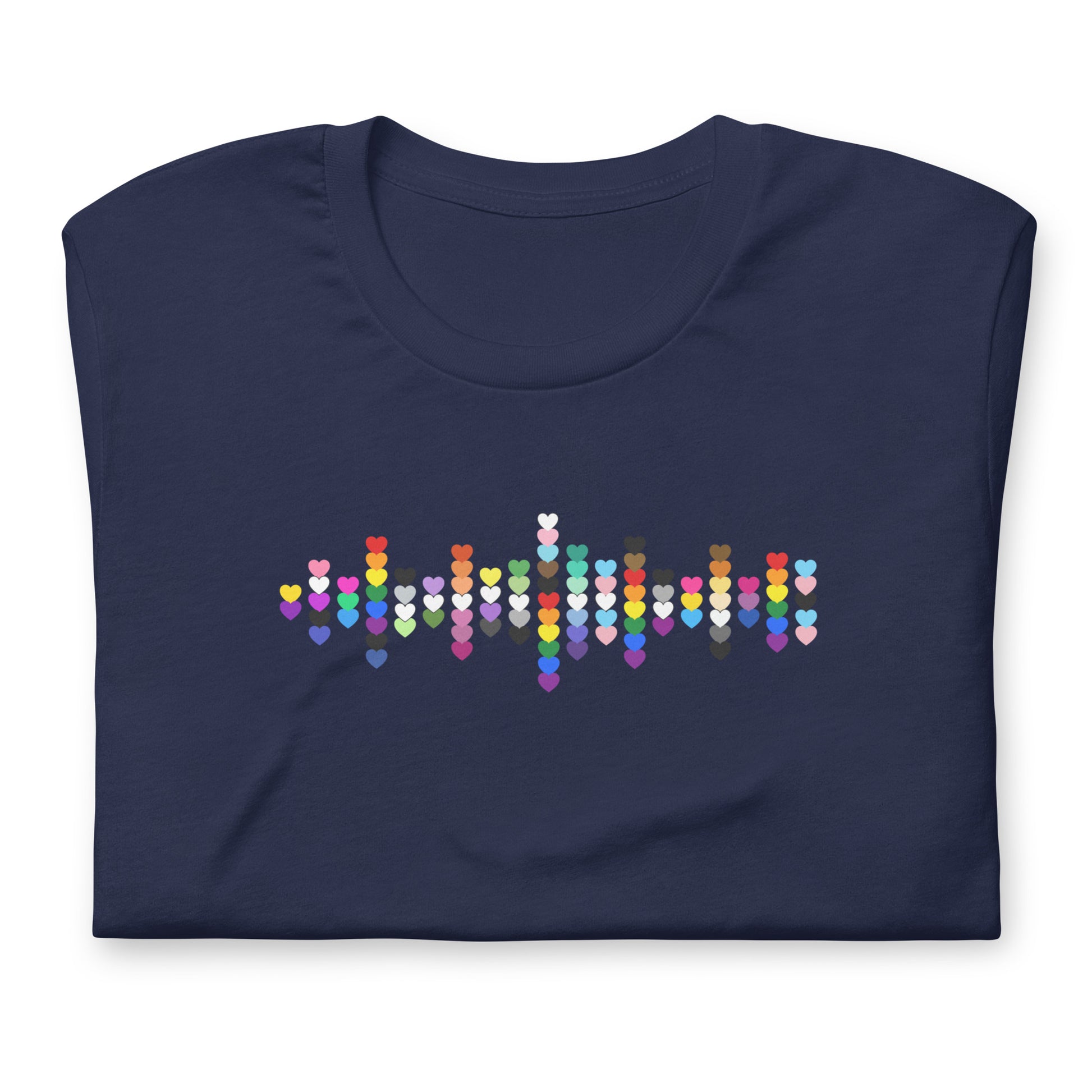 A flat lay folded navy blue t-shirt with a Pride Heart graphic design across the chest.