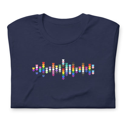A flat lay folded navy blue t-shirt with a Pride Heart graphic design across the chest.