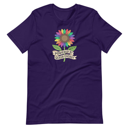 A dark purple short-sleeve t-shirt with a colorful rainbow sunflower graphic on the chest. A banner under the flower reads 'POWERED BY QUEER ENERGY'.