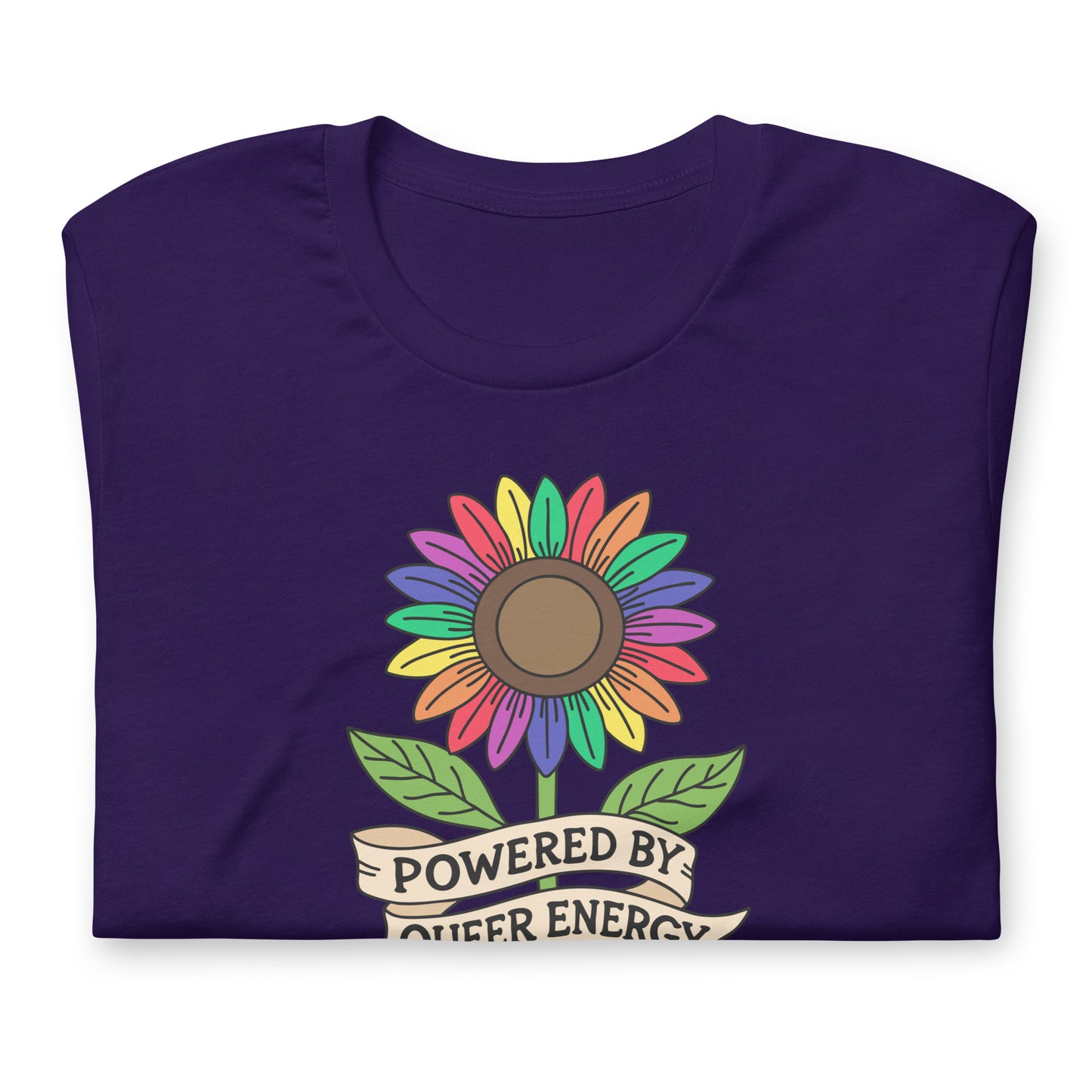 A folded dark purple t-shirt with a colorful rainbow sunflower graphic and a banner underneath that reads 'POWERED BY QUEER ENERGY'.