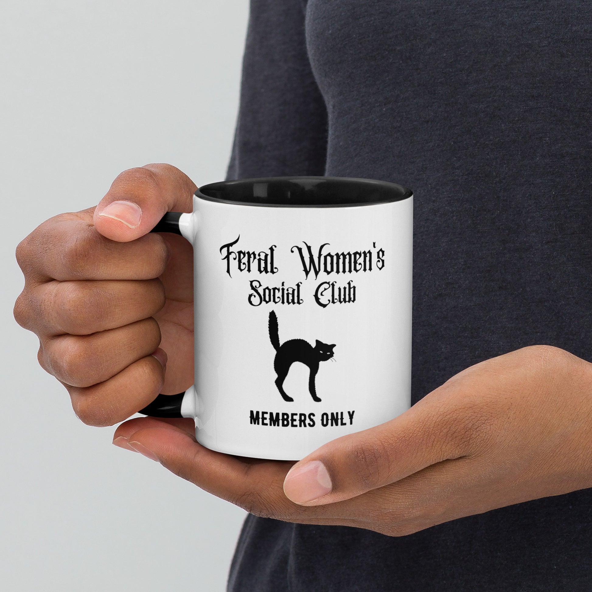 Feral Women's Social Club Accent Coffee Mug by Spinsterly Co, white ceramic with black interior and cat silhouette