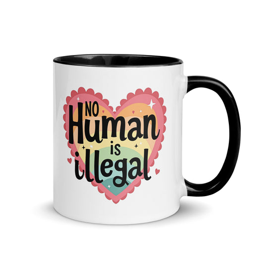 No Human is Illegal Rainbow Heart Accent Coffee Mug Spinsterly Co ceramic mug with glossy finish and black interior