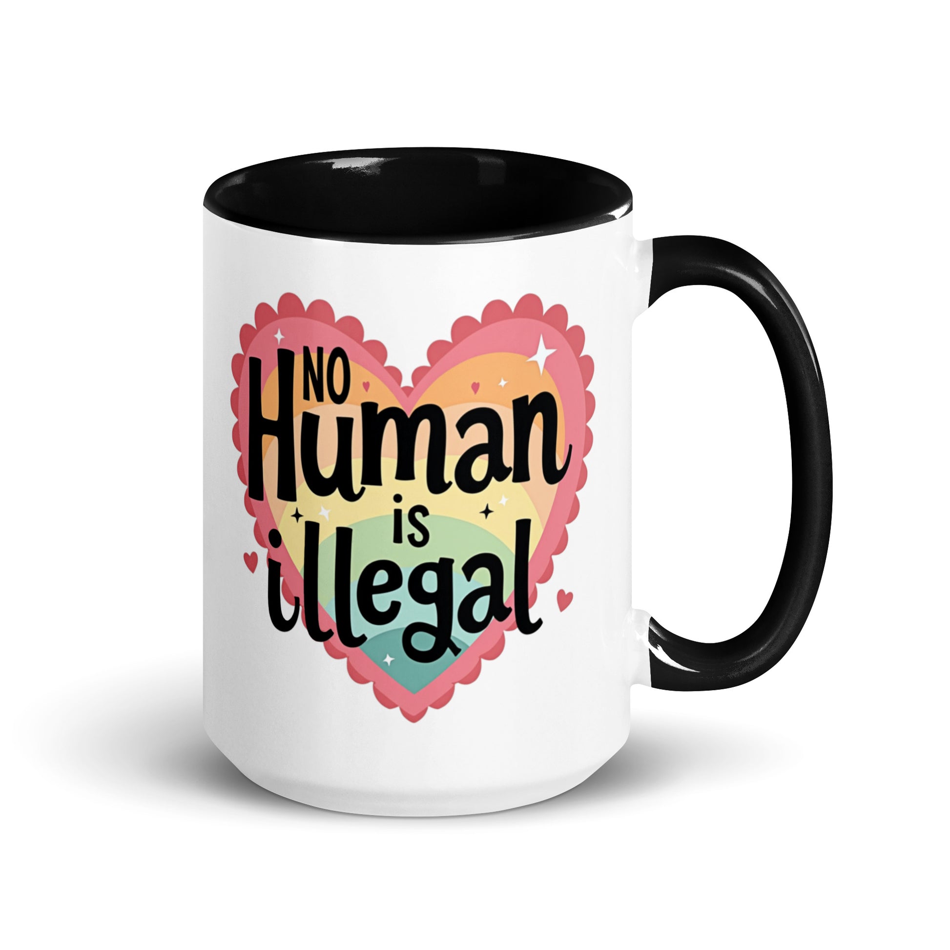 No Human is Illegal Rainbow Heart Accent Coffee Mug by Spinsterly Co, white ceramic with glossy finish