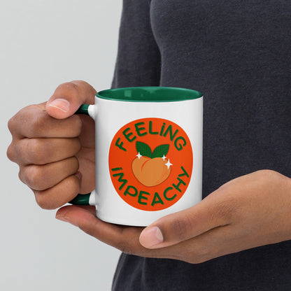 Feeling Impeachy Peach Political Accent Coffee Mug by Spinsterly Co, glossy ceramic with green interior