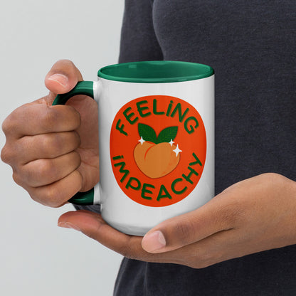 Feeling Impeachy Peach Political Accent Coffee Mug by Spinsterly Co, glossy ceramic with green interior