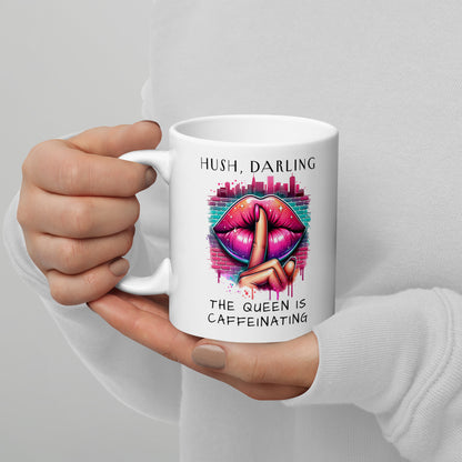Hush Darling The Queen Is Caffeinating White Glossy Mug by Spinsterly Co, glossy ceramic with shush lips graphic