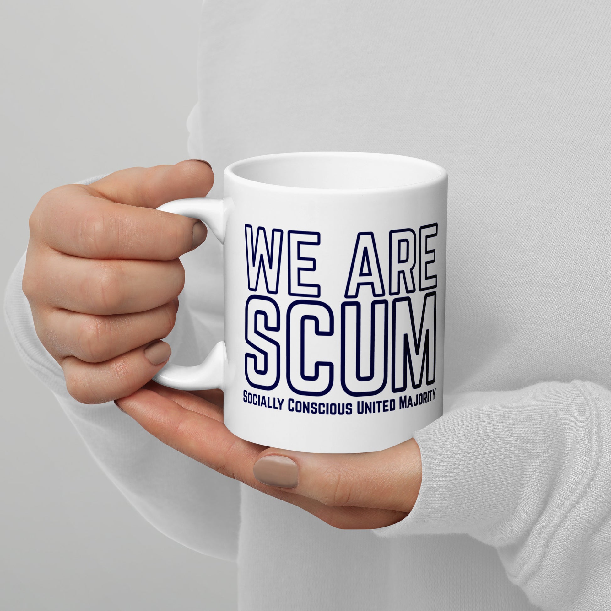 We Are SCUM Socially Conscious United Majority White Glossy Mug by Spinsterly Co, blue text on ceramic