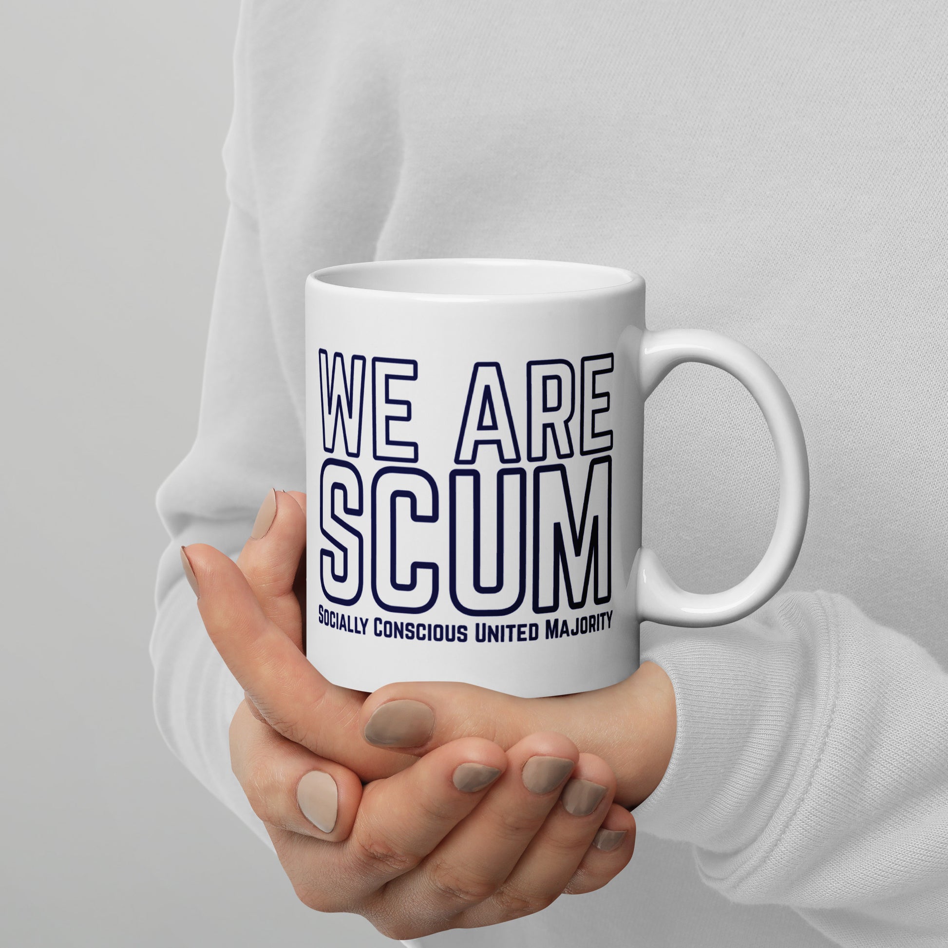 We Are SCUM Socially Conscious United Majority White Glossy Mug by Spinsterly Co, glossy ceramic with blue text