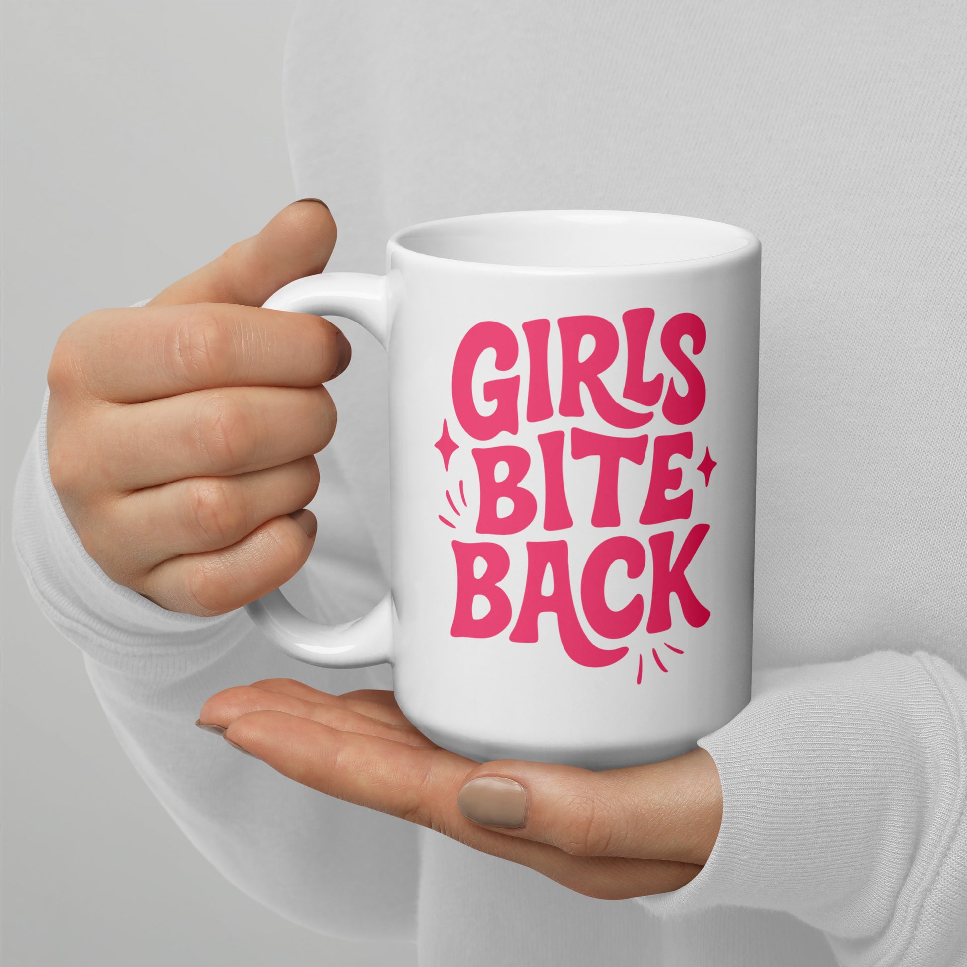 Girls Bite Back Glossy White Coffee Mug by Spinsterly Co, glossy white ceramic with double sided pink lettering