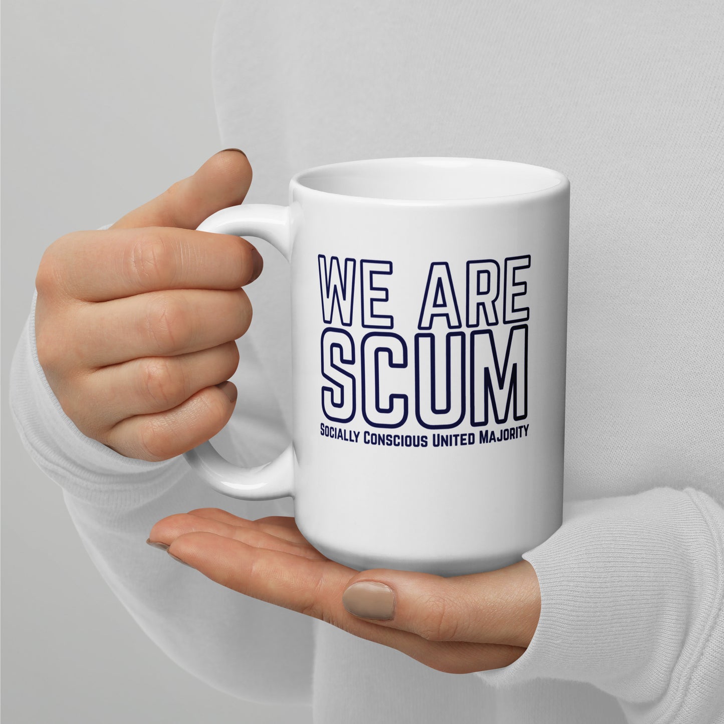 We Are SCUM Socially Conscious United Majority white glossy mug by Spinsterly Co with double-sided blue slogan