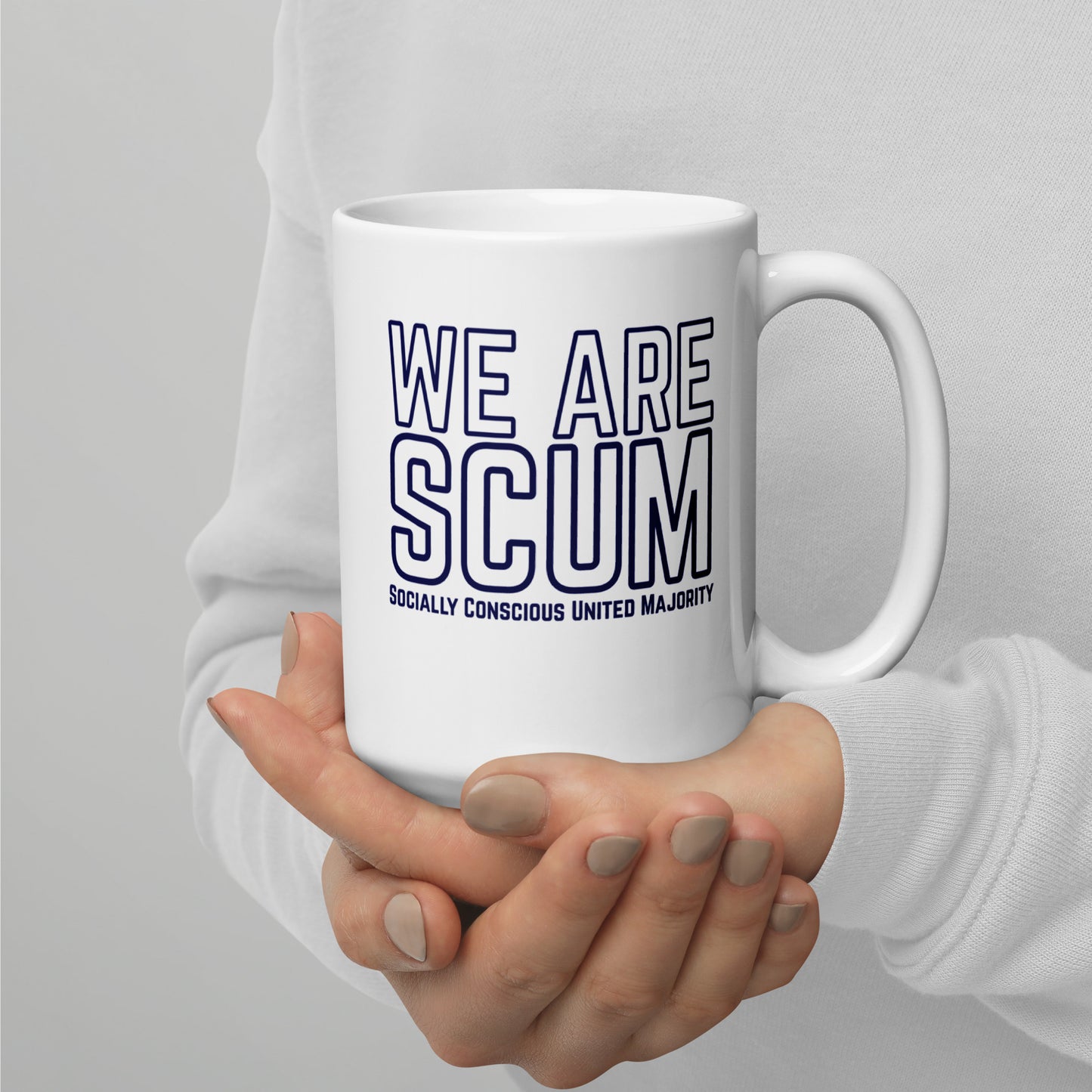 We Are SCUM Socially Conscious United Majority White Glossy Mug by Spinsterly Co, ceramic mug with blue text