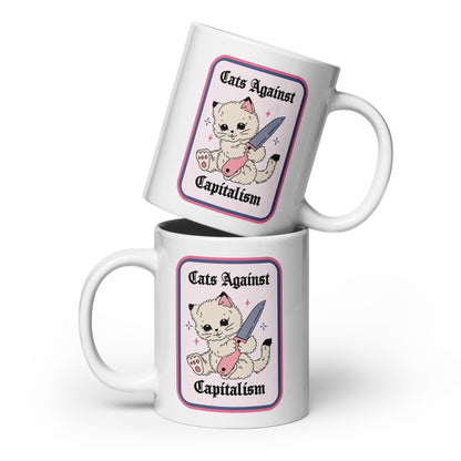 Cats Against Capitalism Glossy White Coffee Mug by Spinsterly Co with protest cat illustration on ceramic