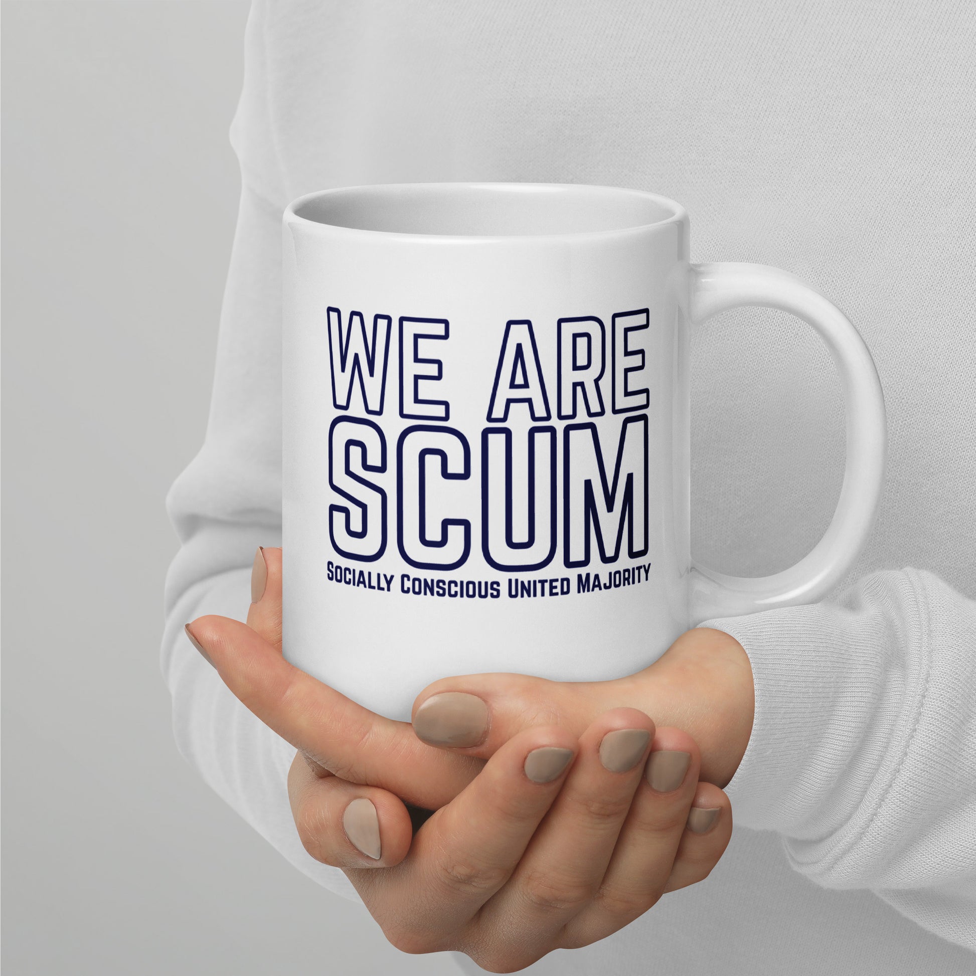 We Are SCUM Socially Conscious United Majority White Glossy Mug by Spinsterly Co, glossy ceramic mug with bold blue text