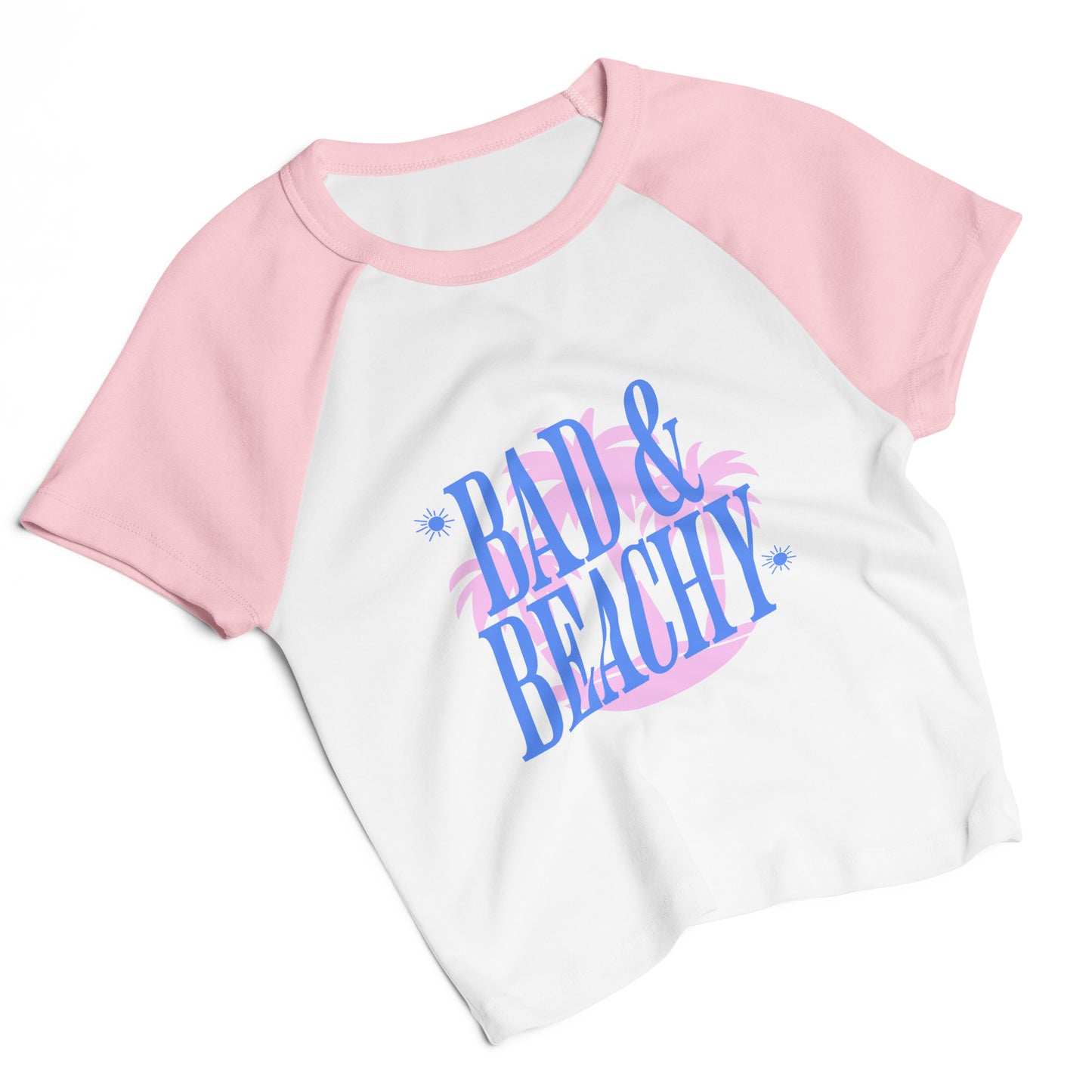 Bad and Beachy Micro Rib Raglan Baby Tee by Spinsterly Co in pink and white with retro palm and flamingo print