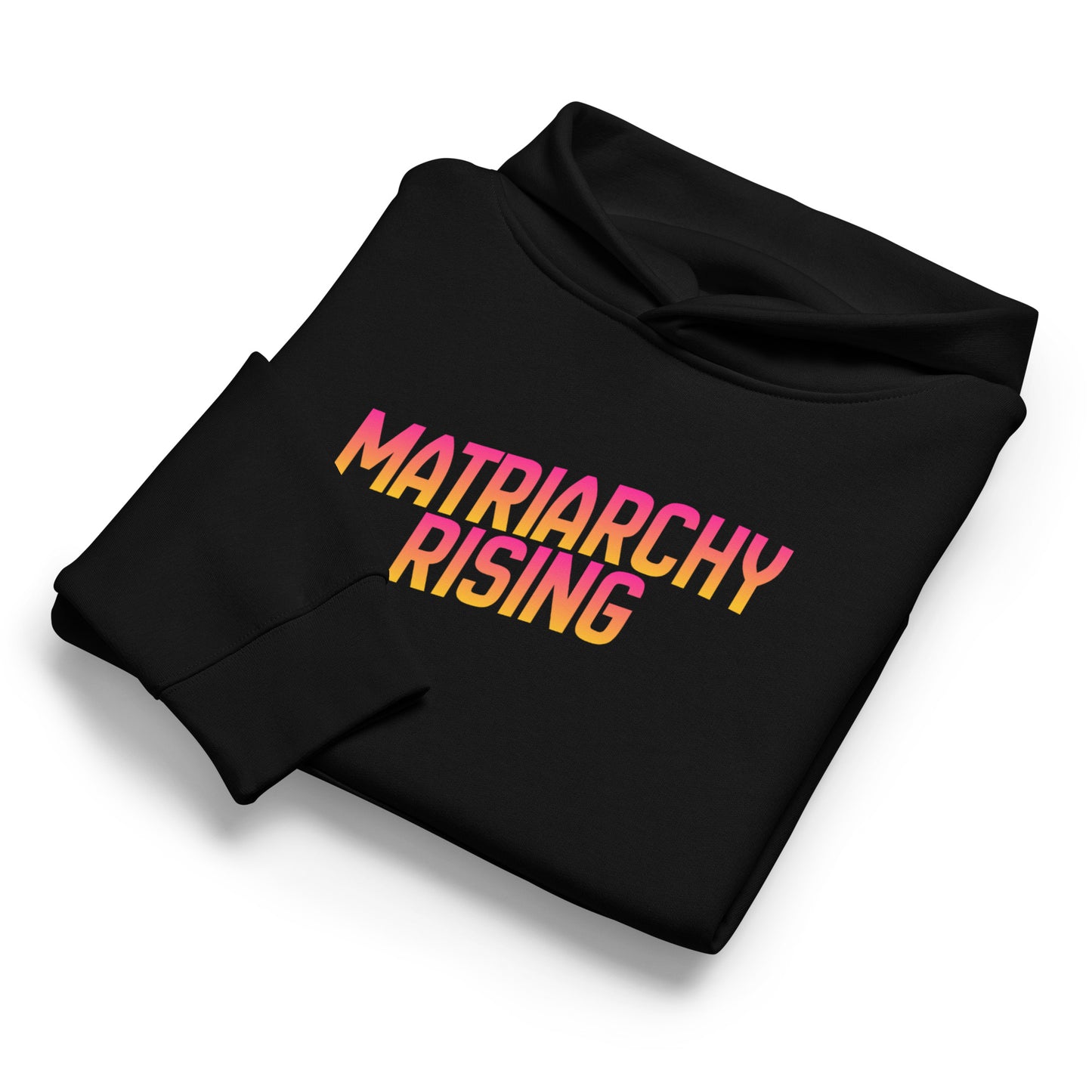 Folded black Matriarchy Rising hoodie showing the sunrise-gradient slogan print.