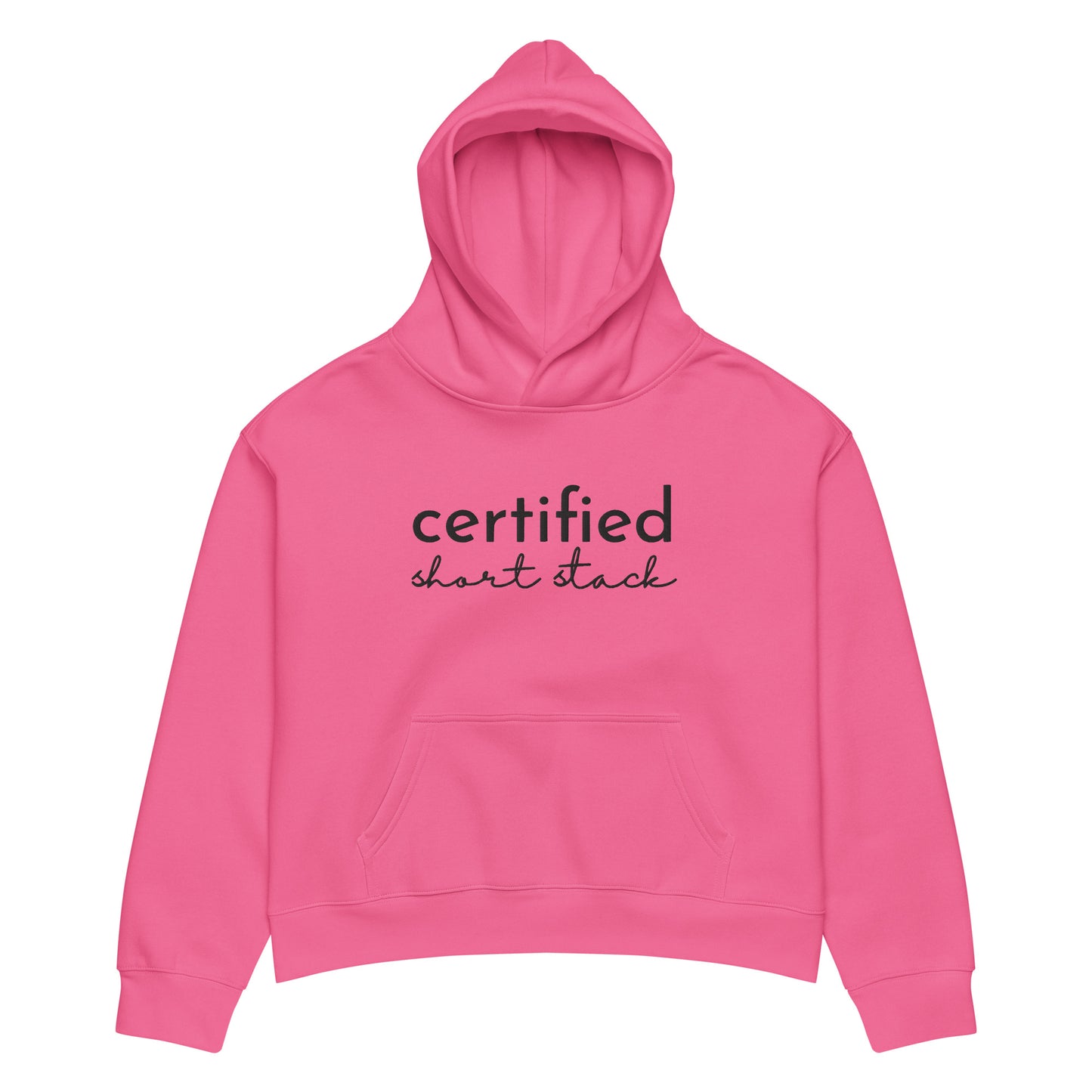 A bright pink cropped hoodie with 'certified short stack' printed in black across the chest, displayed on a clean white background.