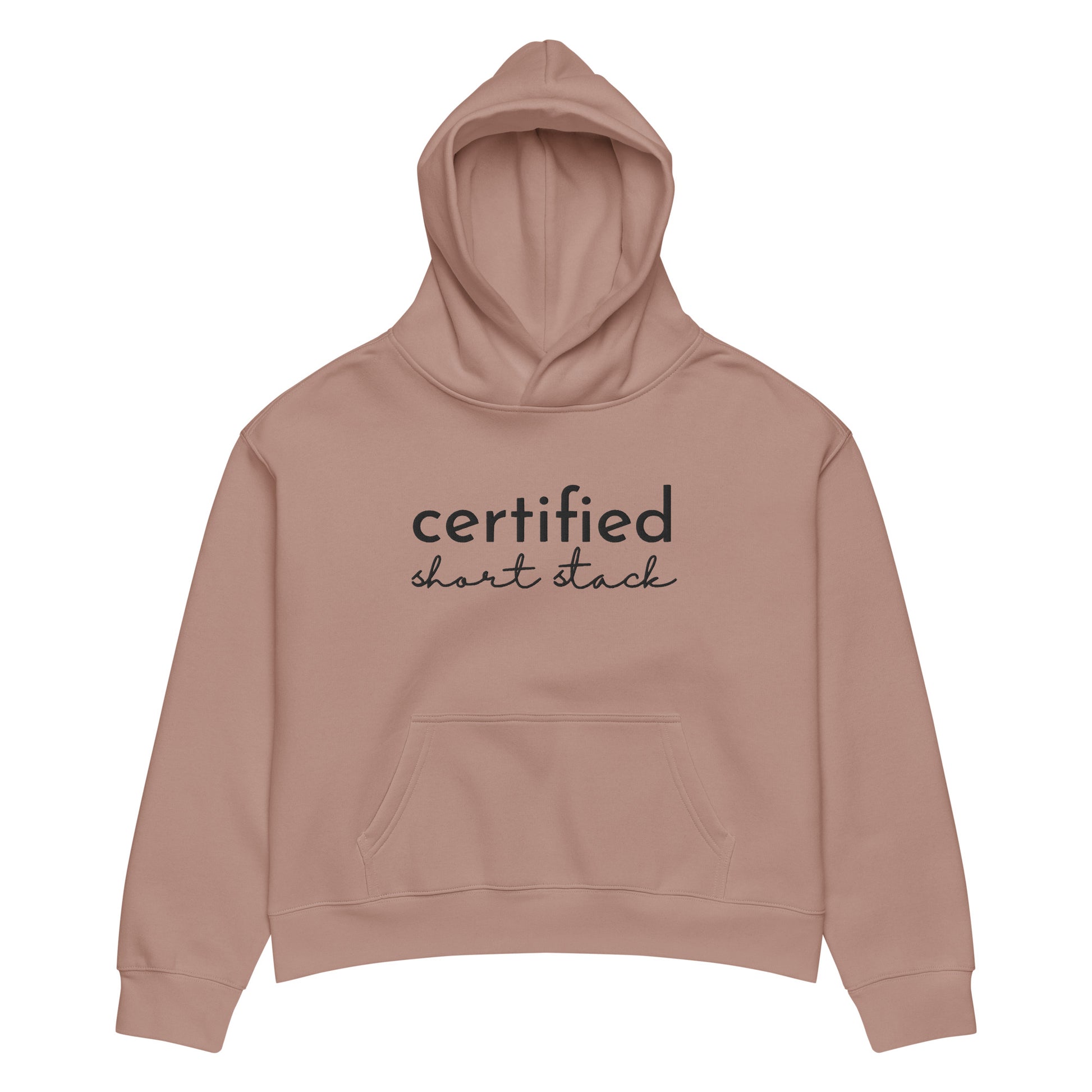 A dusty rose pink cropped hoodie with 'certified short stack' printed in black across the chest, displayed on a clean white background.